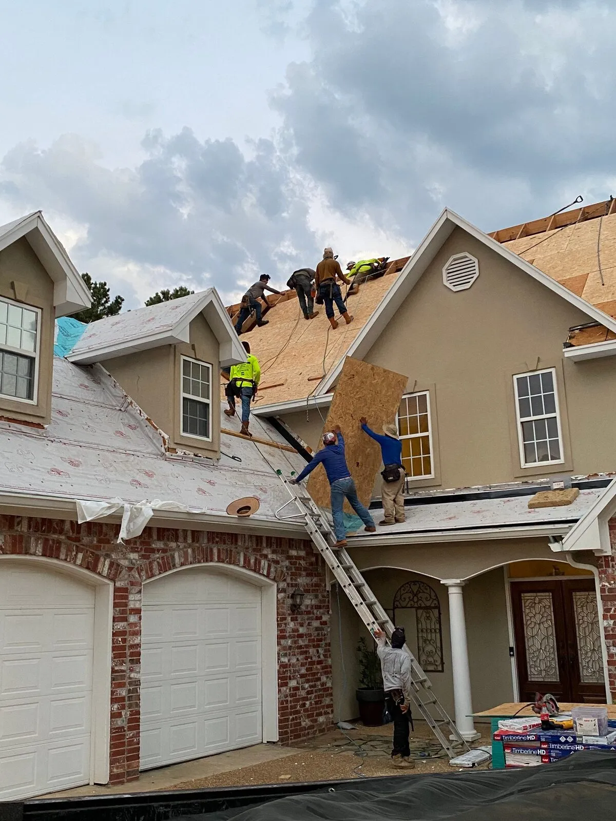 Dickerson Contracting crew working a roof