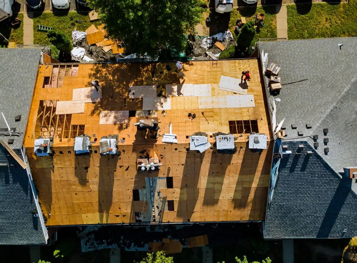 Shingle roof surface evaluated after storm damage in Mississippi